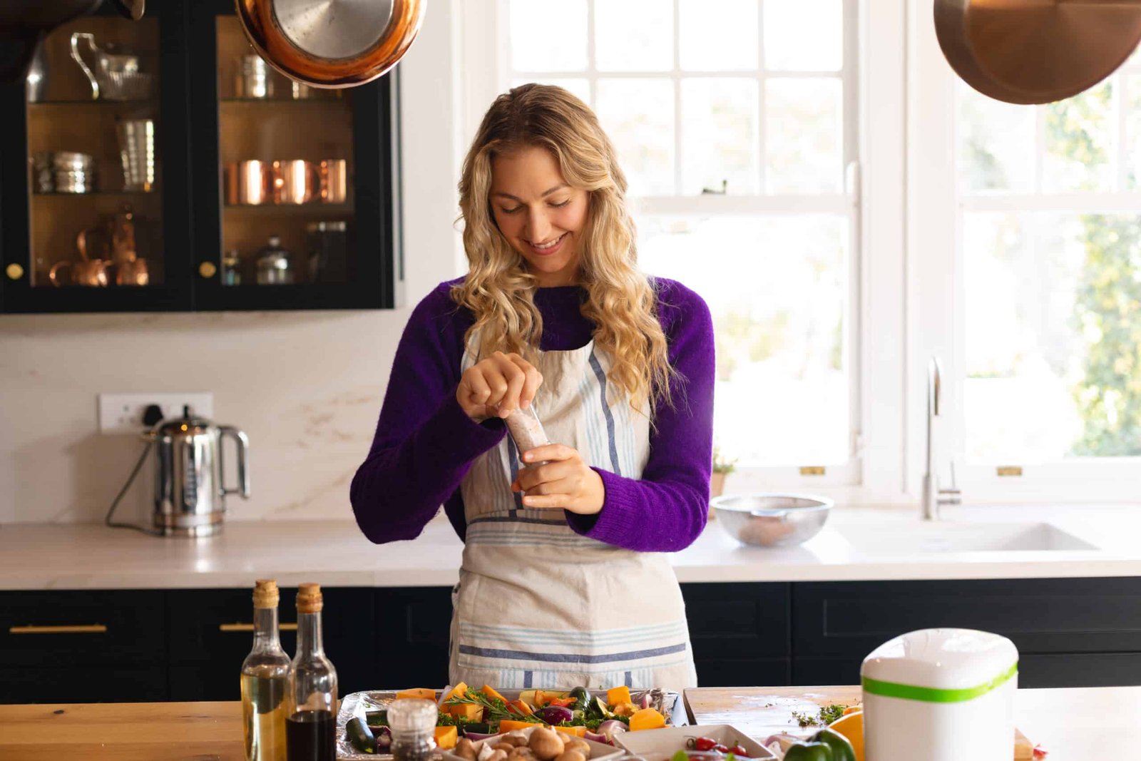 About Me 1 smiling caucasian woman standing in kitchen in apr 2025 04 04 01 58 33 utc scaled